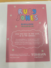 Load image into Gallery viewer, Ruby Jones Poster - Wear your heart on your sleeve, or on your shoulders

